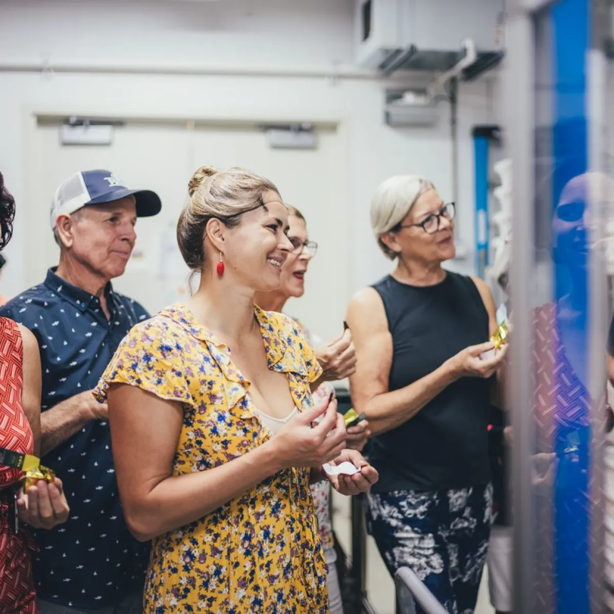 a group of people standing in front of a crowd