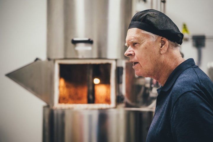 a man standing in a kitchen