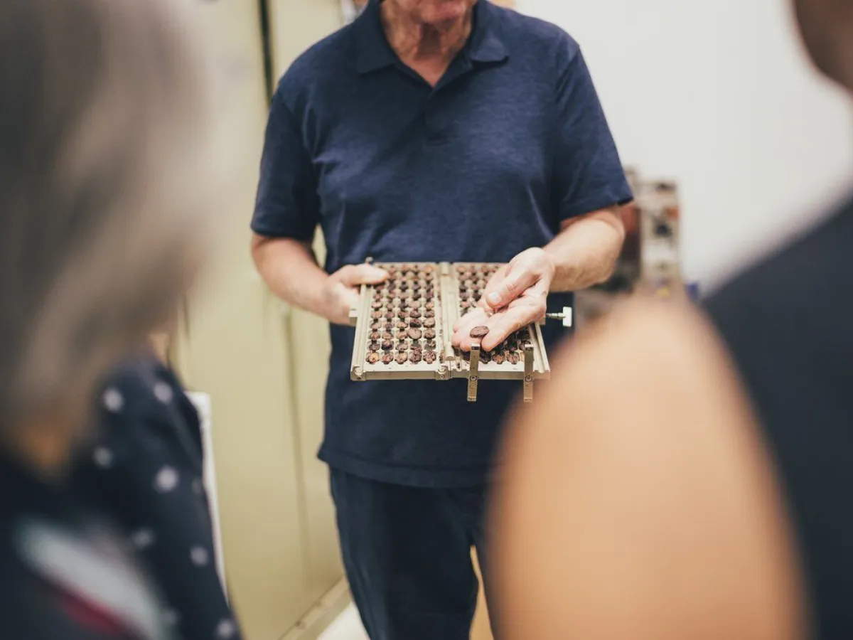 a person standing in front of a laptop