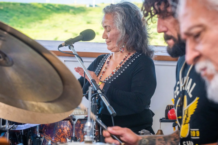 a man sitting on a motorcycle