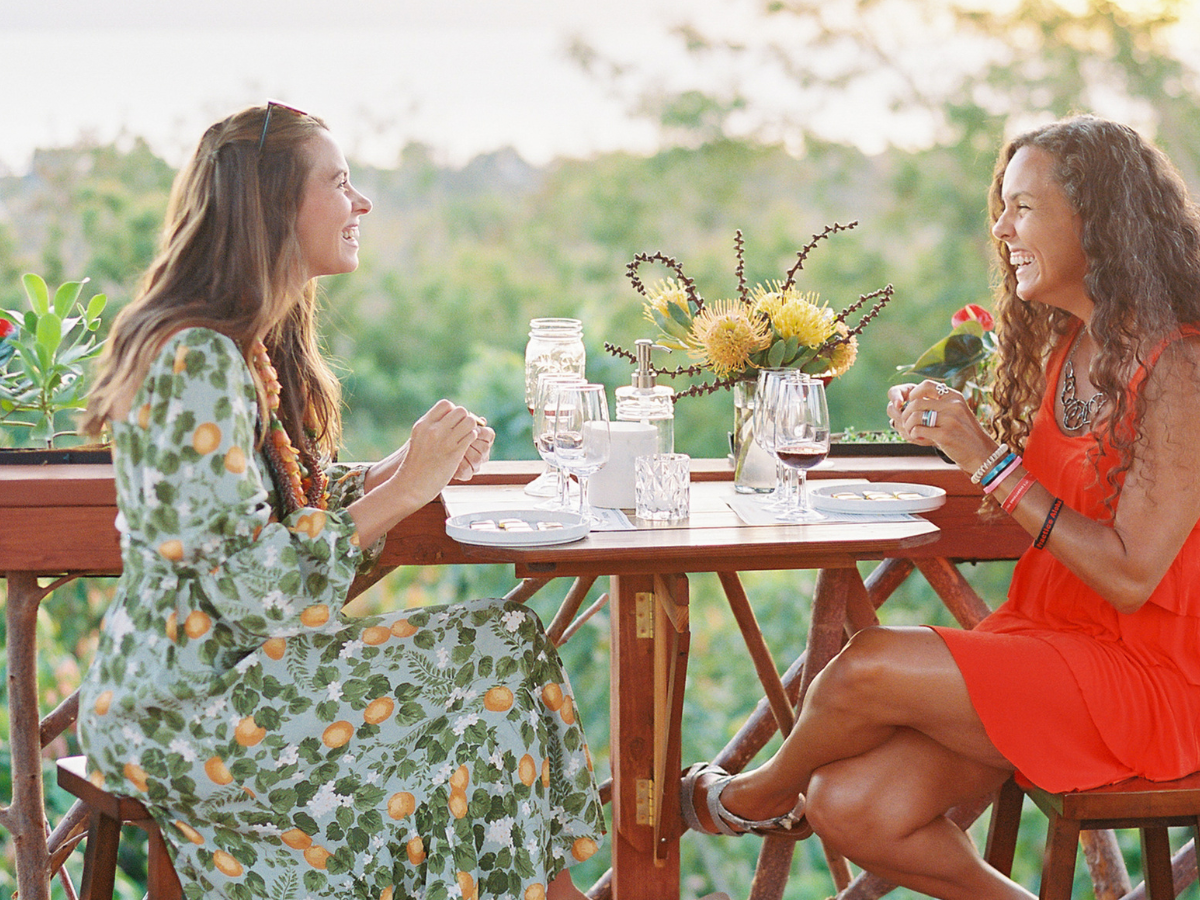 a woman sitting on a bench