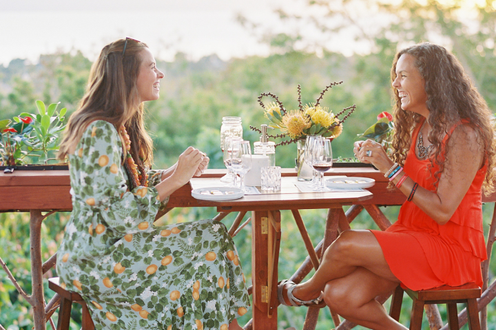 a woman sitting on a bench